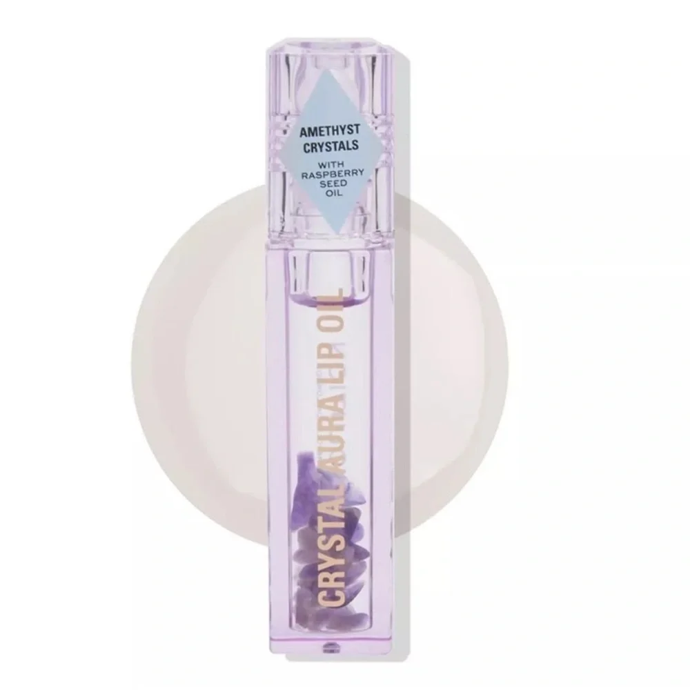 Revolution Purple Amethyst Crystal Aura Lip Oil. Roller ball. Natural.